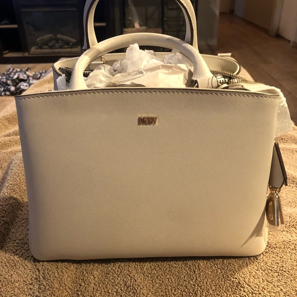Beautiful DKNY white shoulder purse. New with tags.